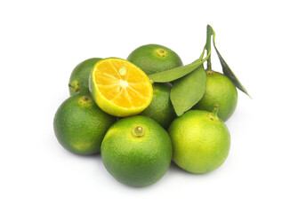 Fresh calamansi limes isolated on white background.