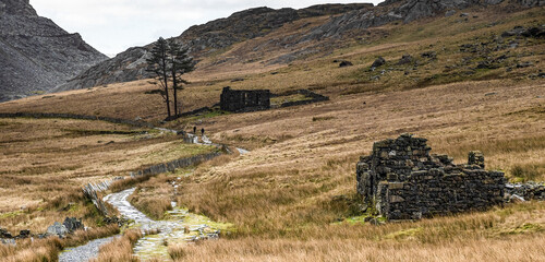 Old miner's chapel with ruined cottage in foreground