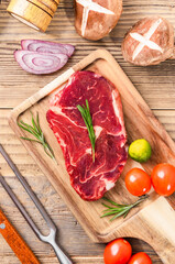 Fresh beef steak on a concrete background