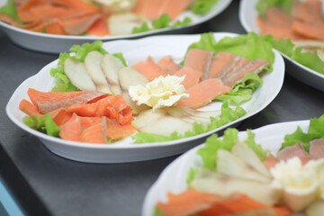 close up.dishes with fish fillet on the kitchen table in the restaurant