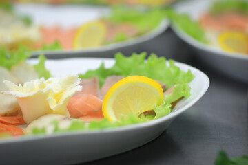 close up.dishes with fish fillet on the kitchen table in the restaurant