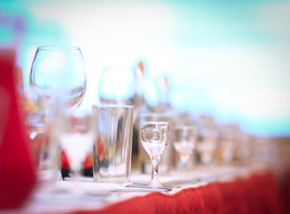 close up.glass wine glasses and cups on the table