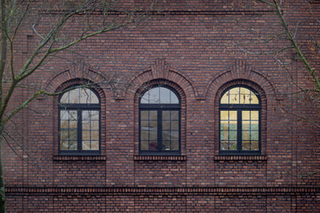 Fototapeta na wymiar window in the old brick industrial building