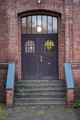 Fototapeta na wymiar entrance to an old brick industrial building