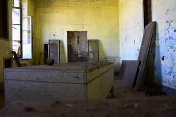 Room full with old furniture in an abandoned house.