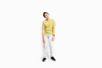Single skinny young male. The full body of an Asian or Indonesian person. Isolated photo studio...