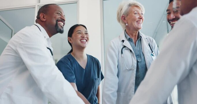 Healthcare team, hands together and celebration in hospital for teamwork success, medical collaboration and happiness motivation. Medic support, doctors goal and nurse celebrate or excited in clinic
