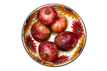 Melograni in coppa ceramica decorata