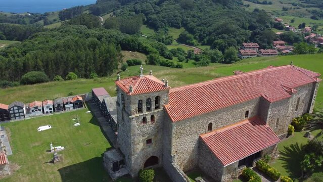 Iglesia de San Pedro church in Barcena, Spain along the camino del norte hike drone clip