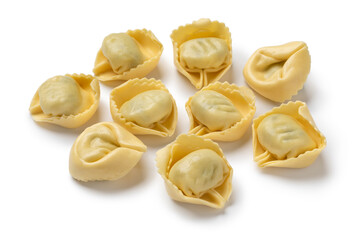 Fototapeta na wymiar Fresh made traditional Italian tortellini stuffed with Ricotta and Spinach full frame close up as background 