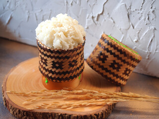 Sticky rice in traditional bamboo basket. Thai and lao main food.