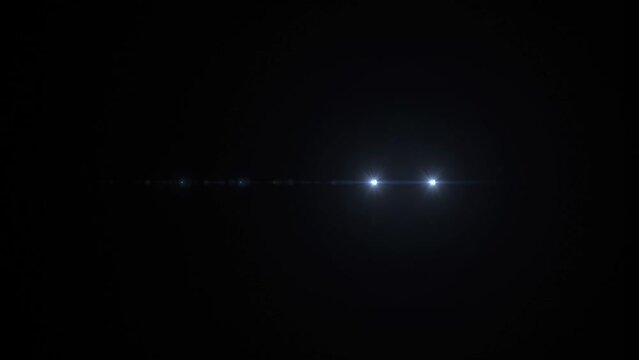 Optical flares on black background 4k footage, Flares for animation, titles flares background, lens flare