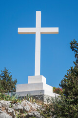 The white cross on the top of Marjan hill in Split