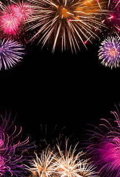Fireworks in the night sky. Vertical, vibrant party invitation with black background, birthday, New Year's celebration invitation concept.
