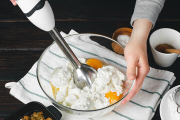  The process of kneading dough. Preparing batter. Mixing curd dough