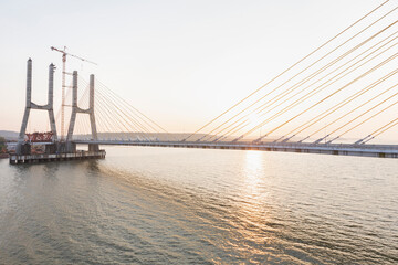 Fototapeta na wymiar Cortalim, Goa - India - Dec 22nd 2022: New Zuari Bridge will be inaugurated on 29th December 2022 by Mr. Nitin Gadkari. Twin 4 Lane Zuari Bridge undertaken by Dilip Buildcon Ltd.