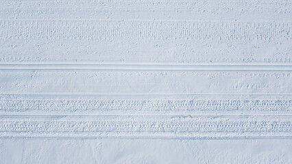 Prepared (cross country-) ski track with track of snow groomer