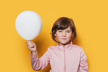 Cute girl with blank balloon