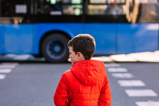 Boy ready to cross road
