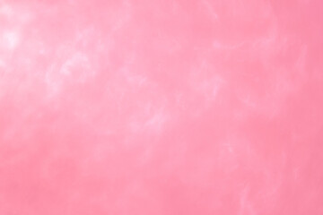 delicate pink background with sequins waves liquid motion