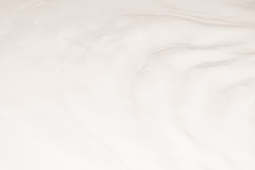 White liquid, waves, fluidity.