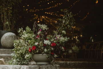 bouquet of flowers on stones. Event decoration.
