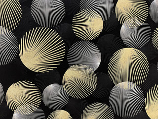 On a dark background, balls in the form of seashells or fireworks in silver and gold shades, wallpaper, texture