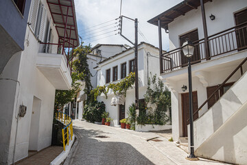 Typical narrow Greek streets and architecture with country side houses style in small village named Potamia at Thasos island, South-East from Thessaloniki 