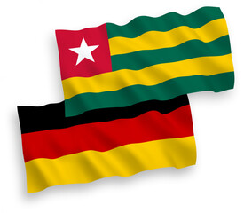 Flags of Togolese Republic and Germany on a white background