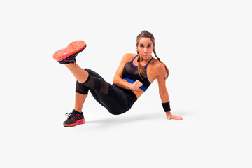 Fototapeta premium Mid age woman working out. Female fitness instructor exercising and working out HIIT. Strong woman working out. Fitness lifestyle.