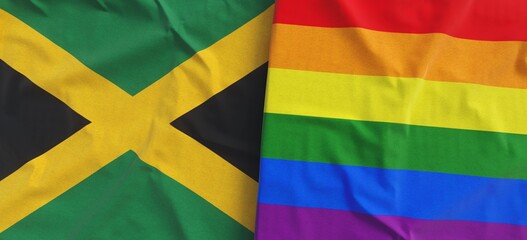 Jamaican and LGBT flags. Linen flag close-up. Kingston, Caribbean. Rainbow flag. Flag made of canvas. State symbol. 3d illustration.