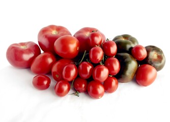 red and deep green tomatoes for tasty salad close up