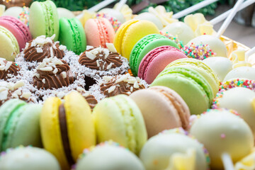 Sweets on plate with delicious macarons 