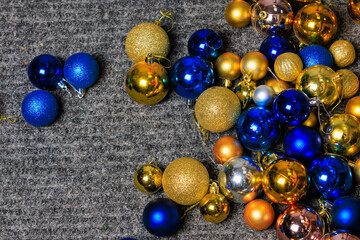 Christmas balls on the floor. Preparation for the holidays. Background with selective focus
