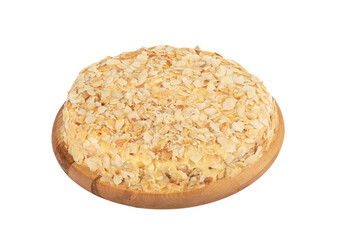 Swedish almond cake on a white background, fluffy egg whites in the base and rich egg yolks in custard, gluten free.