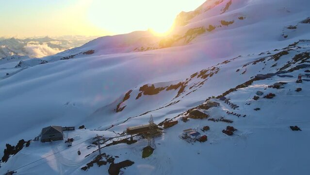 Aerial view of the two-headed peak of Mount Elbrus at sunset