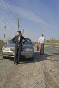 Man With Car Trouble, Man Hitchhiking With Jerry Can