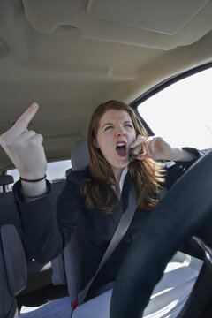 Angry Driver Making Obscene Gesture
