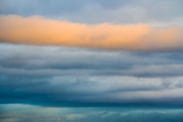 Fototapeta premium Fancy colorful clouds in the evening sky