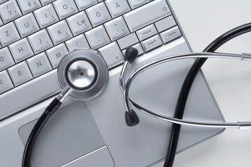 Stethoscope and Laptop Computer