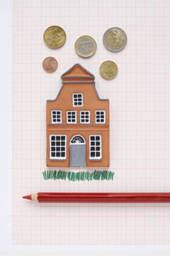 House, Coloured Pencil and Euros on Graph Paper