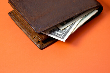 Leather wallet with money in cash