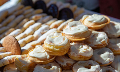 Heap of glazed donuts, selective focus