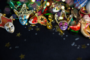 carnival masks, confetti and serpentine, happy Mardi Gras in italian holiday card. parade Shrove...