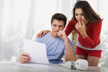 Couple Looking at Document