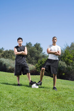 Portrait of Men with Soccer Ball