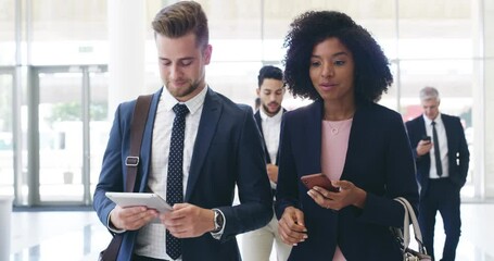 Business people, walking and talking in office, convention and browse internet. Black woman, man and coworkers in hotel for discussion, conversation and planning with tablet and phone for conference. - Powered by Adobe