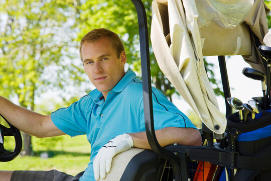 Man in Golf Cart