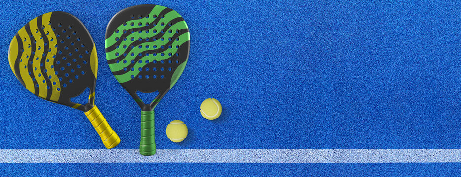Close up of a padel ball and rackets on a blue syntehtic playground	