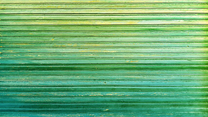 Old background of green wooden planks board texture.